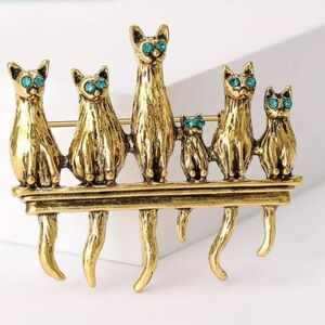 Gold Cat Brooch with Blue Accents
